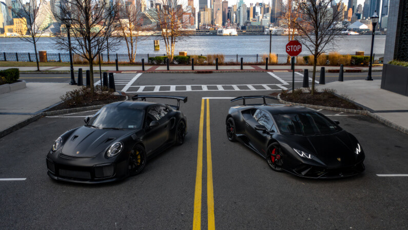 2020.04.14 Hoboken, New Jersey - Porsche 911 GT2RS with a Lamborghini Huracan Performante and the New York City skyline in the back.